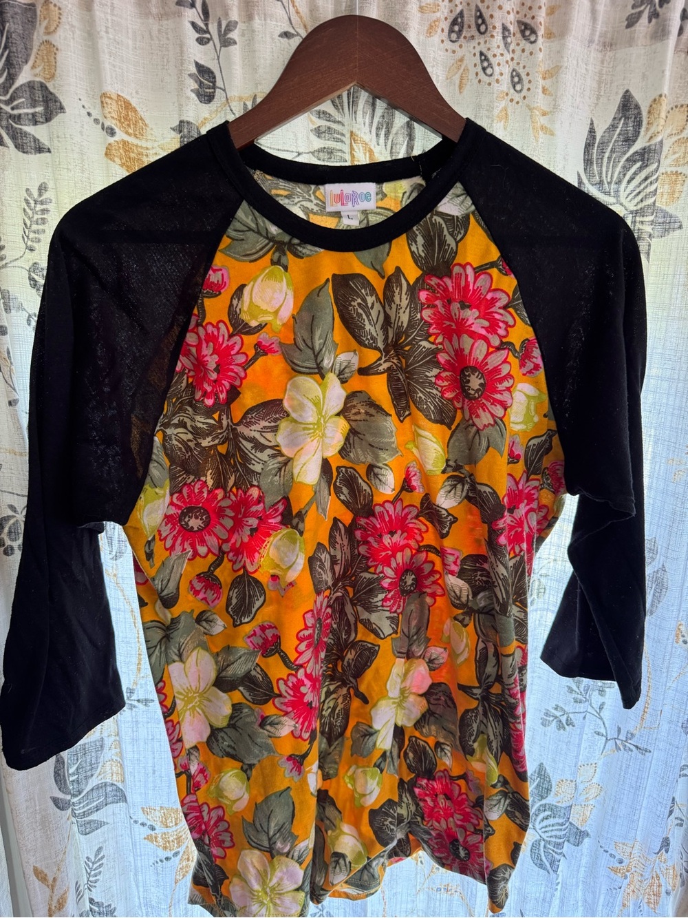 LuLaRoe Black Sleeve Floral Raglan Top